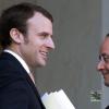 (FILES) -- A file picture taken on March 26, 2014 shows France's president Francois Hollande (R) speaking with Elysee palace's deputy secretary-general Emmanuel Macron, in Paris. French President Francois Hollande on August 26, 2014 named Emmanuel Macron, a former Rothschild banker and close ally, new economy minister in an emergency reshuffle after a major political crisis. AFP PHOTO/ ALAIN JOCARDALAIN JOCARD/AFP/Getty Images